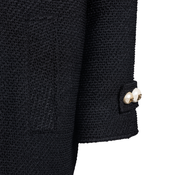 Black coat with pearl buttons                                                                                                                          DOLCE&GABBANA
