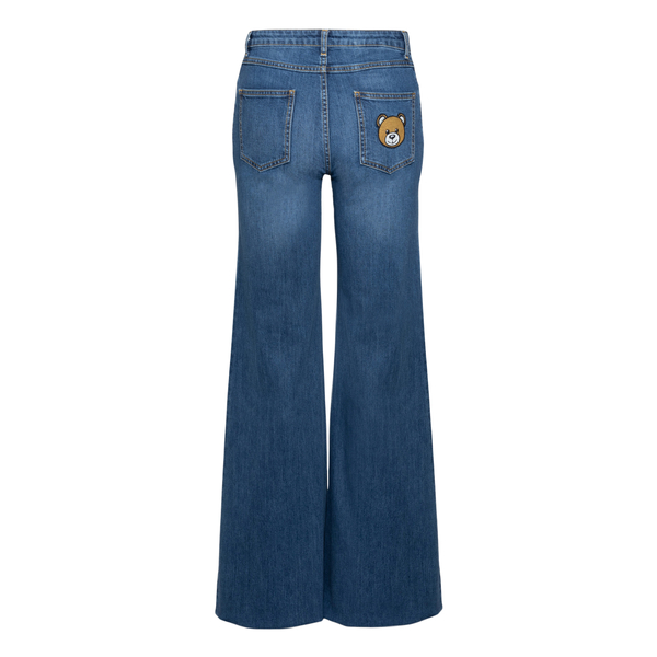 Jeans blu a zampa con patch orsetto                                                                                                                    davanti
